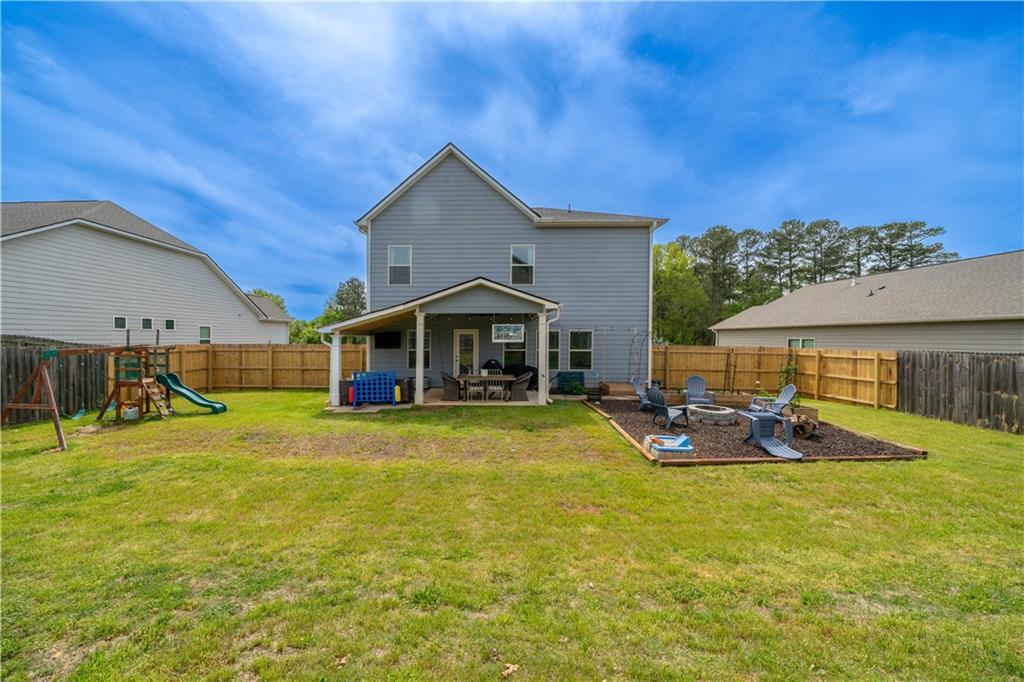 172 Mercer Lane Cartersville, GA 30120 - Photo 37 of 44 a front view of house with outdoor seating and yard
