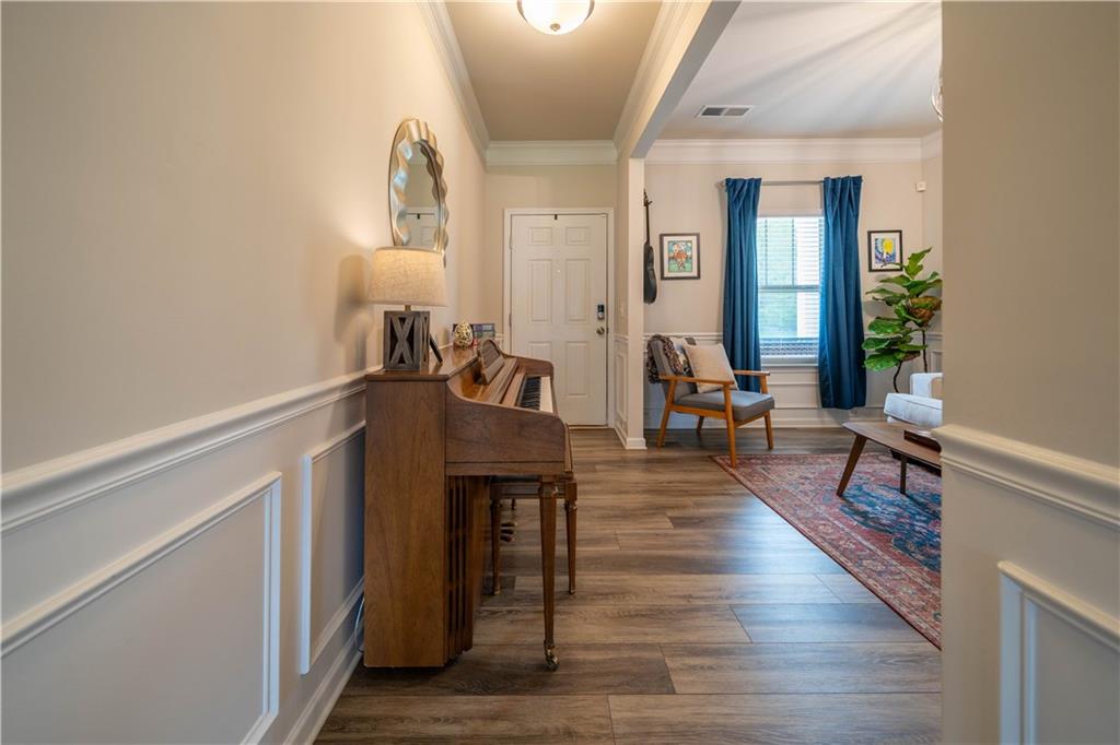 172 Mercer Lane Cartersville, GA 30120 - Photo 4 of 44 a living room with furniture and a wooden floor