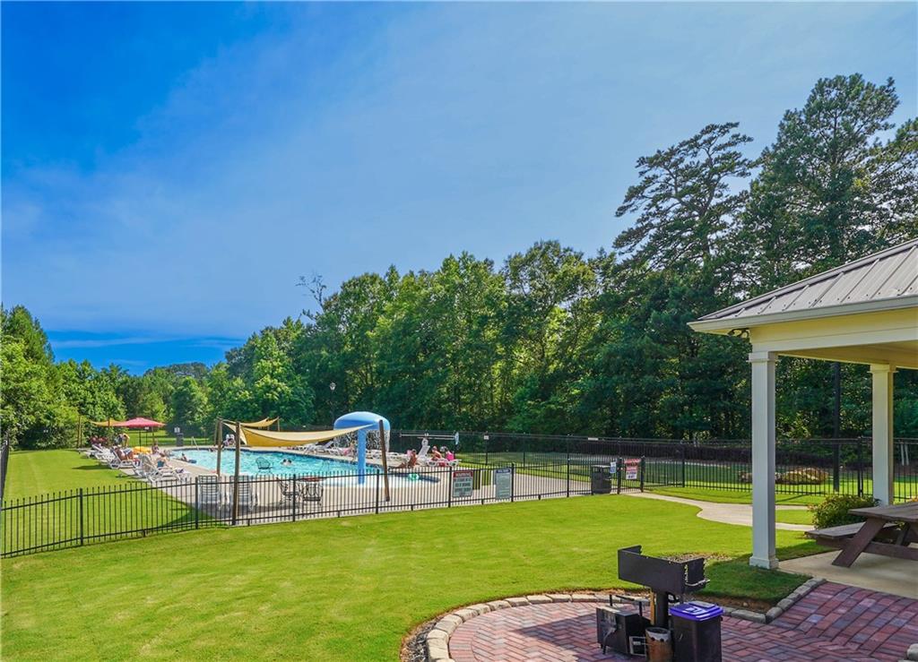 172 Mercer Lane Cartersville, GA 30120 - Photo 44 of 44 a view of a swimming pool with a patio