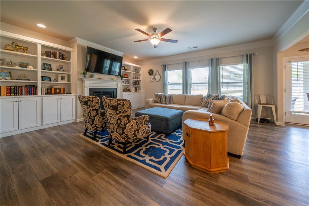 172 Mercer Lane Cartersville, GA 30120 - Photo 6 of 44 a living room with furniture fireplace and flat screen tv