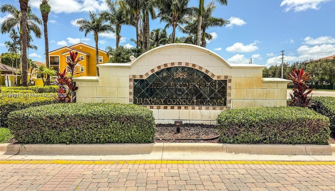 2120 West Preserve Way, Unit 307 Miramar, FL 33025 - Photo 20 of 20 a view of swimming pool with a yard
