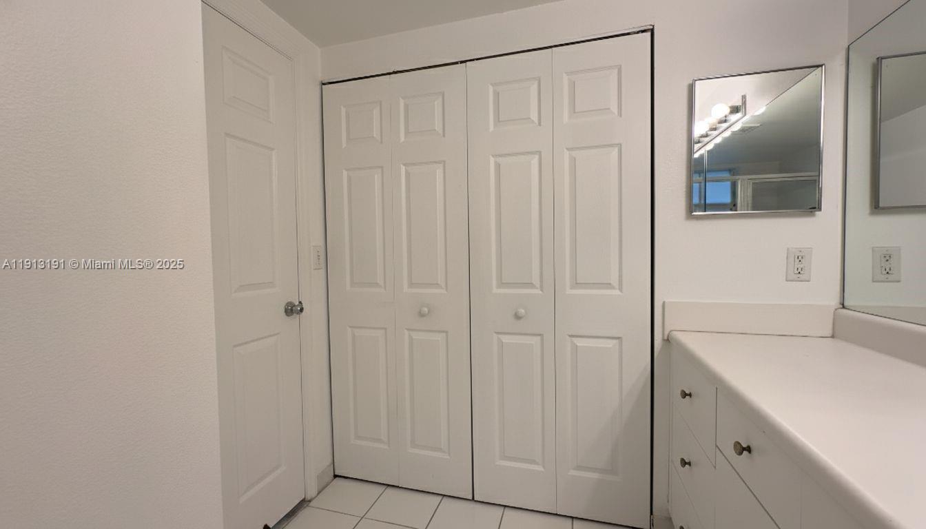 2120 West Preserve Way, Unit 307 Miramar, FL 33025 - Photo 8 of 20 a bathroom with a sink and mirror