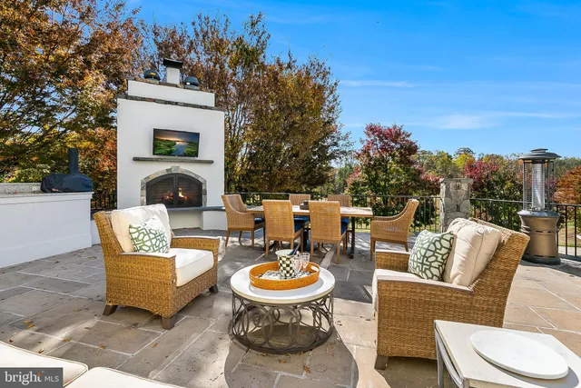 a stove top oven sitting inside of a kitchen