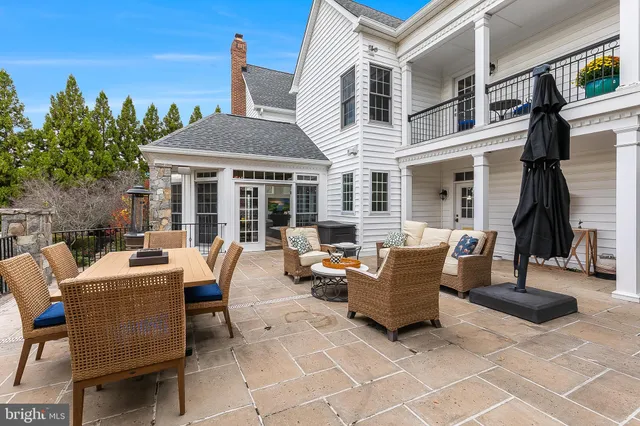 a bathroom with a sink toilet double vanity and shower
