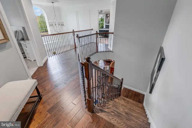 an aerial view of a house with a big yard