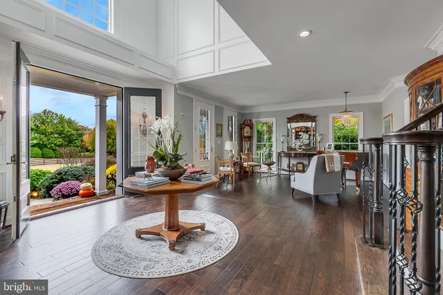 a workspace with furniture window and wooden floor