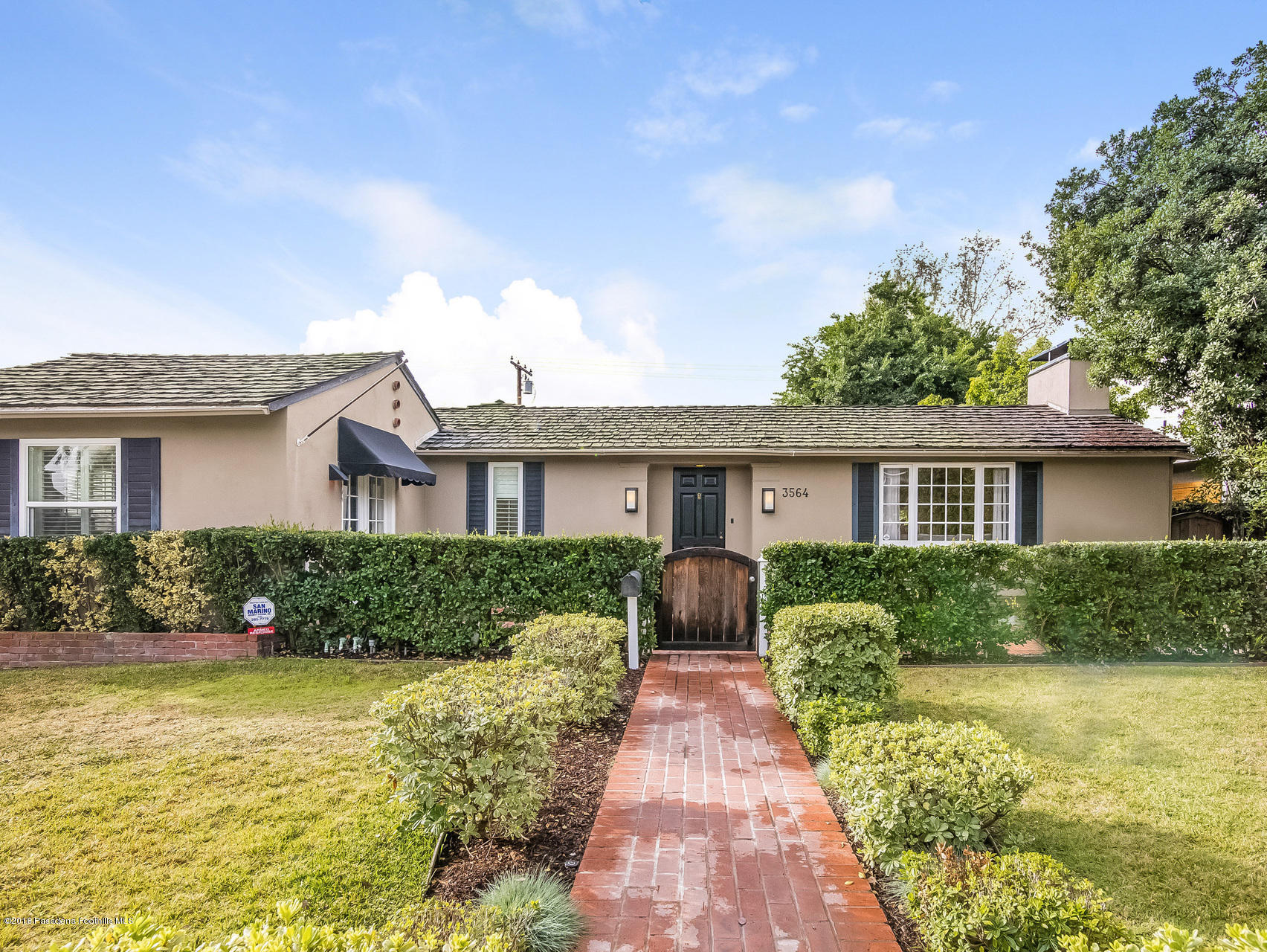 3564 Thorndale Road Pasadena, CA 91107 - Photo 2 of 24 a front view of house with yard and green space