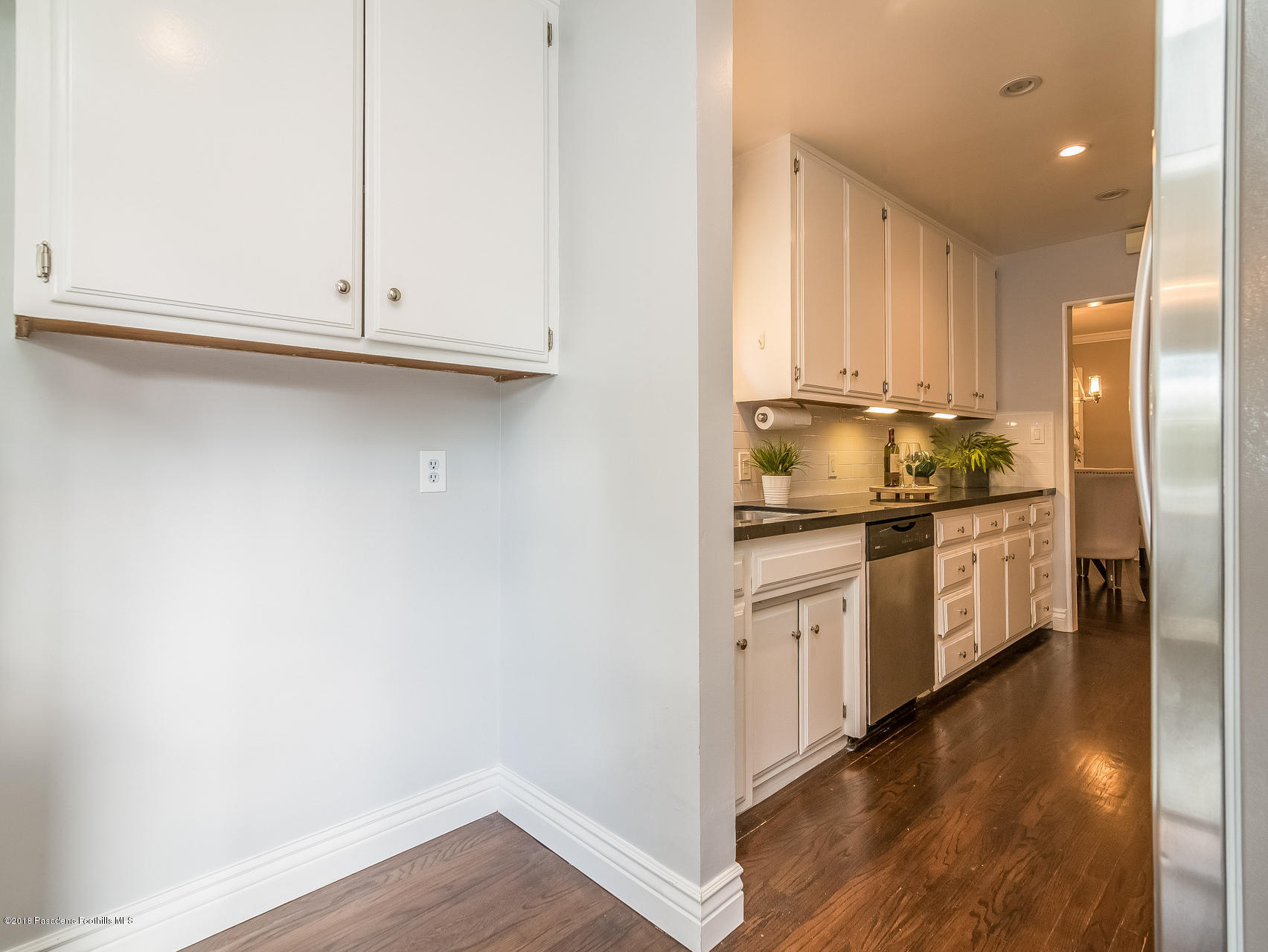 3564 Thorndale Road Pasadena, CA 91107 - Photo 12 of 24 a kitchen with stainless steel appliances granite countertop a refrigerator and a stove top oven