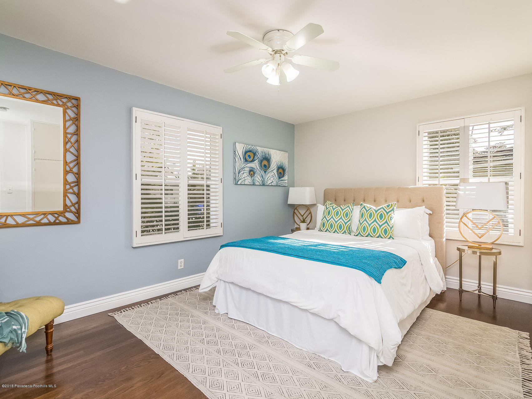 3564 Thorndale Road Pasadena, CA 91107 - Photo 14 of 24 a bedroom with a large bed chandelier and a window