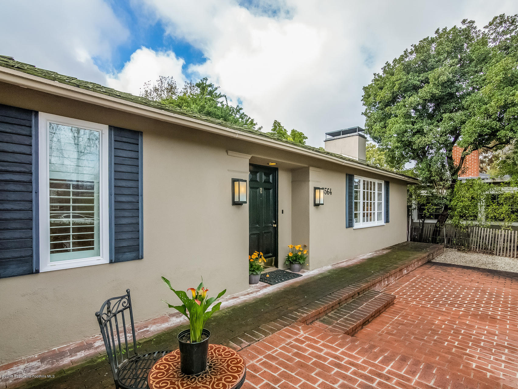 3564 Thorndale Road Pasadena, CA 91107 - Photo 3 of 24 a front view of a house with garden