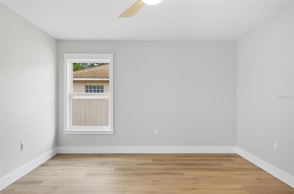 13 Fanshawe Lane Palm Coast, FL 32137 - Photo 23 of 60 a view of an empty room with a window