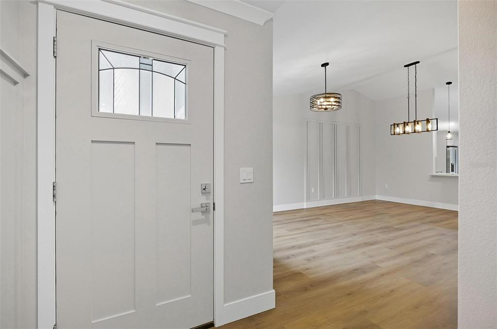 13 Fanshawe Lane Palm Coast, FL 32137 - Photo 3 of 60 a view of an empty room with a window