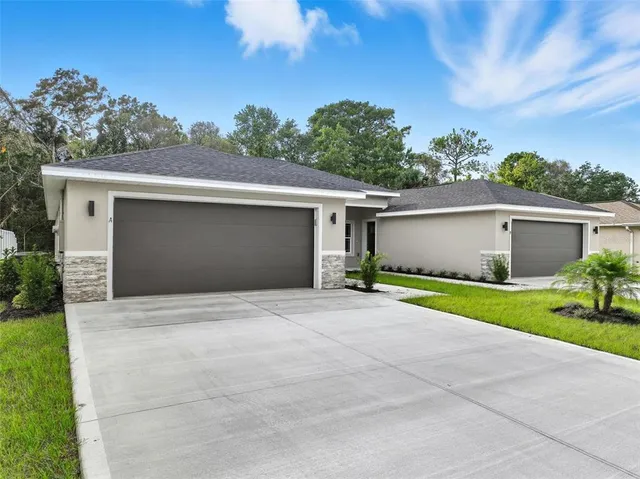 $569,900 | 13 Fanshawe Lane, Palm Coast, FL 32137