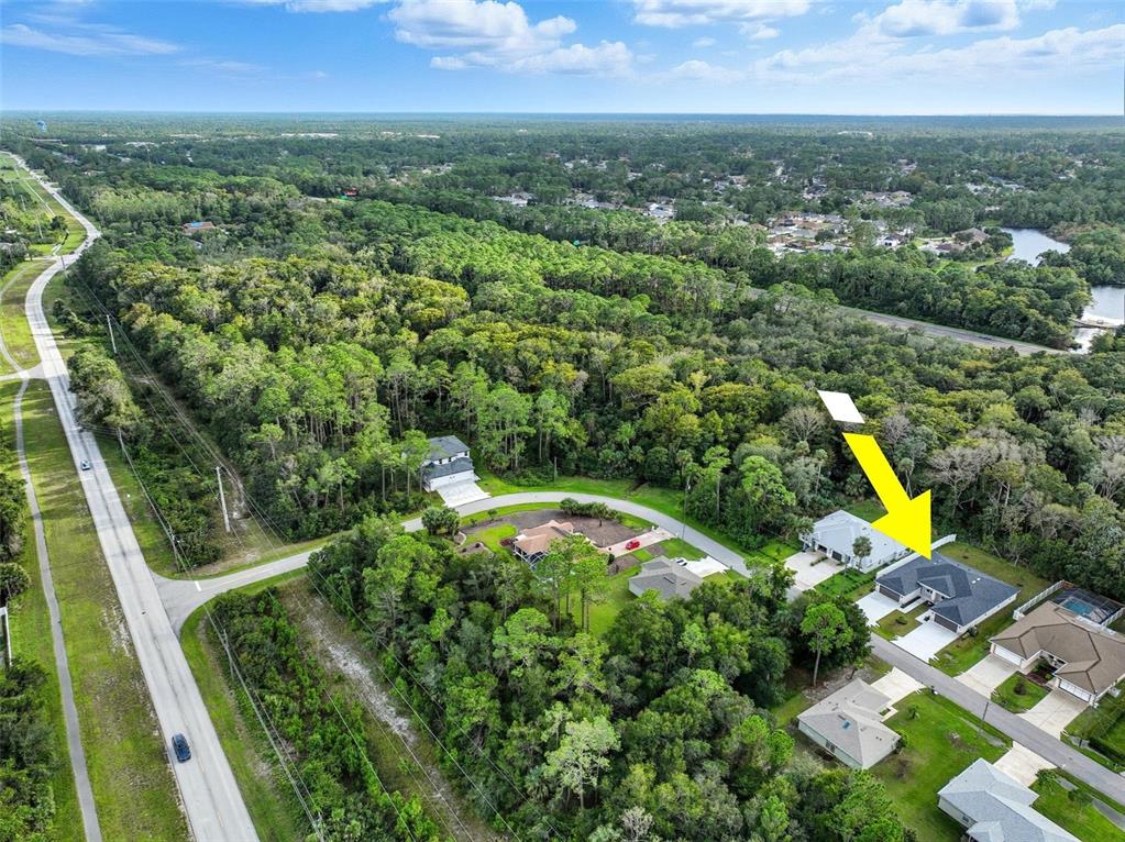 13 Fanshawe Lane Palm Coast, FL 32137 - Photo 59 of 60 an aerial view of residential houses with outdoor space and swimming pool