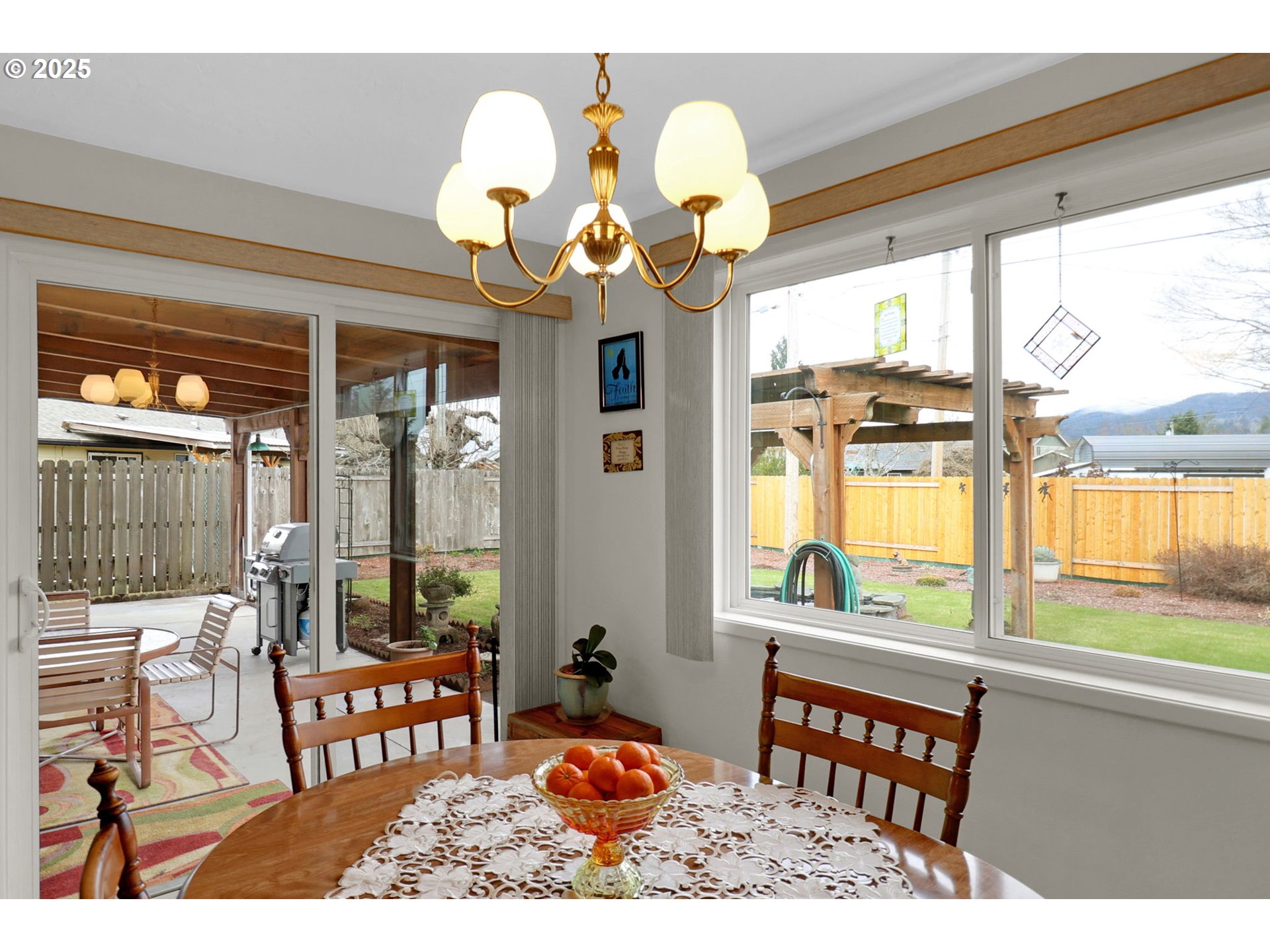 1448 Cheek Street Springfield, OR 97477 - Photo 12 of 28 a dining room filled with furniture and window