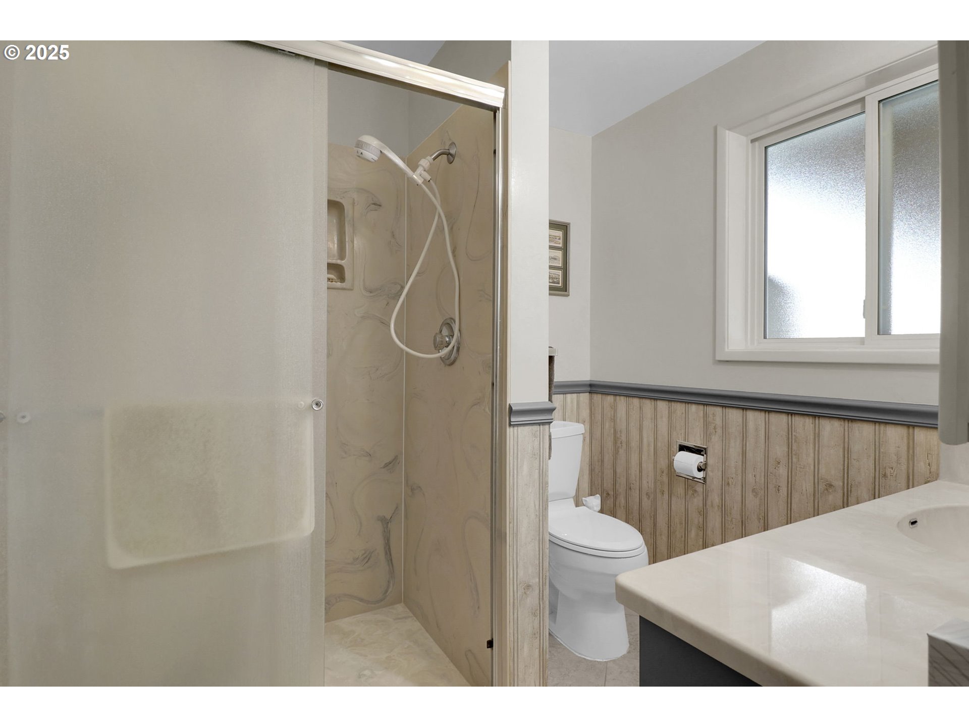 1448 Cheek Street Springfield, OR 97477 - Photo 15 of 28 a bathroom with a granite countertop sink a toilet and shower
