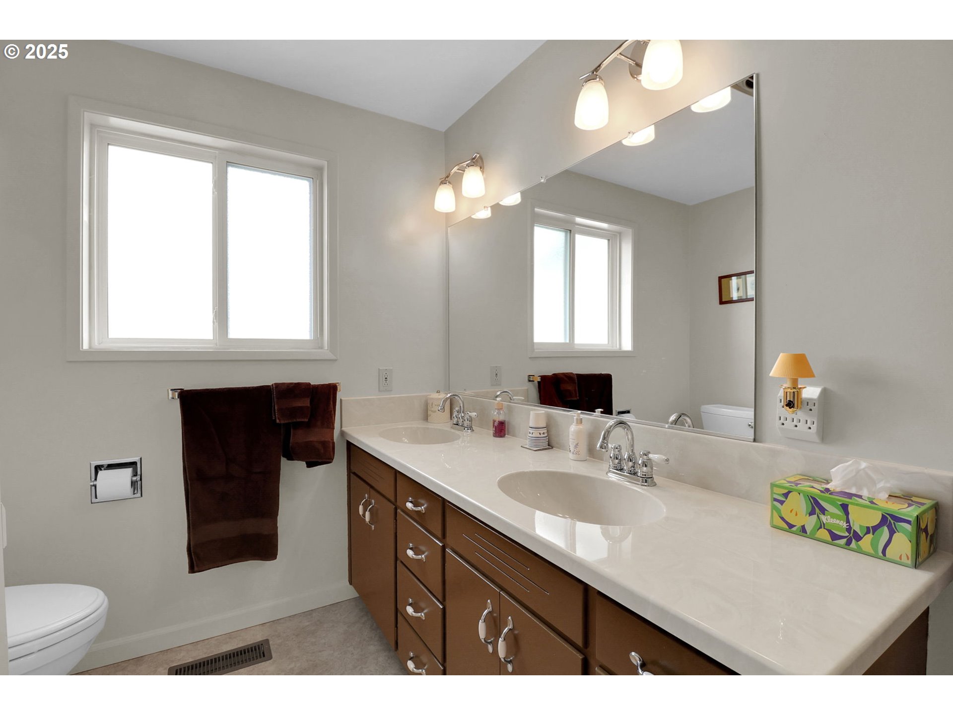 1448 Cheek Street Springfield, OR 97477 - Photo 20 of 28 a bathroom with a sink double vanity and a toilet