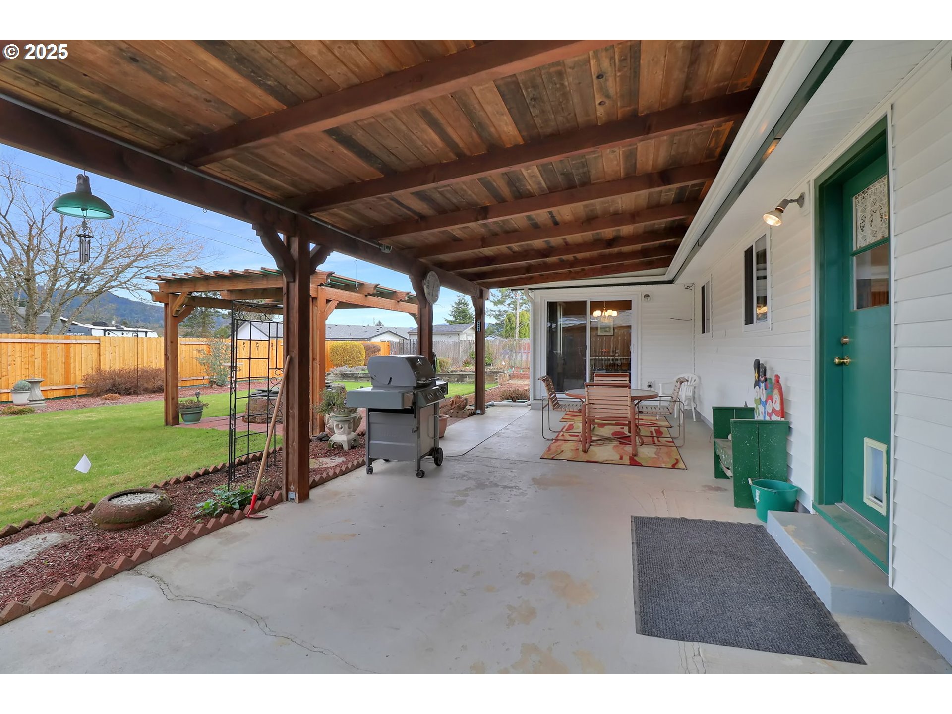 1448 Cheek Street Springfield, OR 97477 - Photo 23 of 28 a view of a porch with furniture and garden
