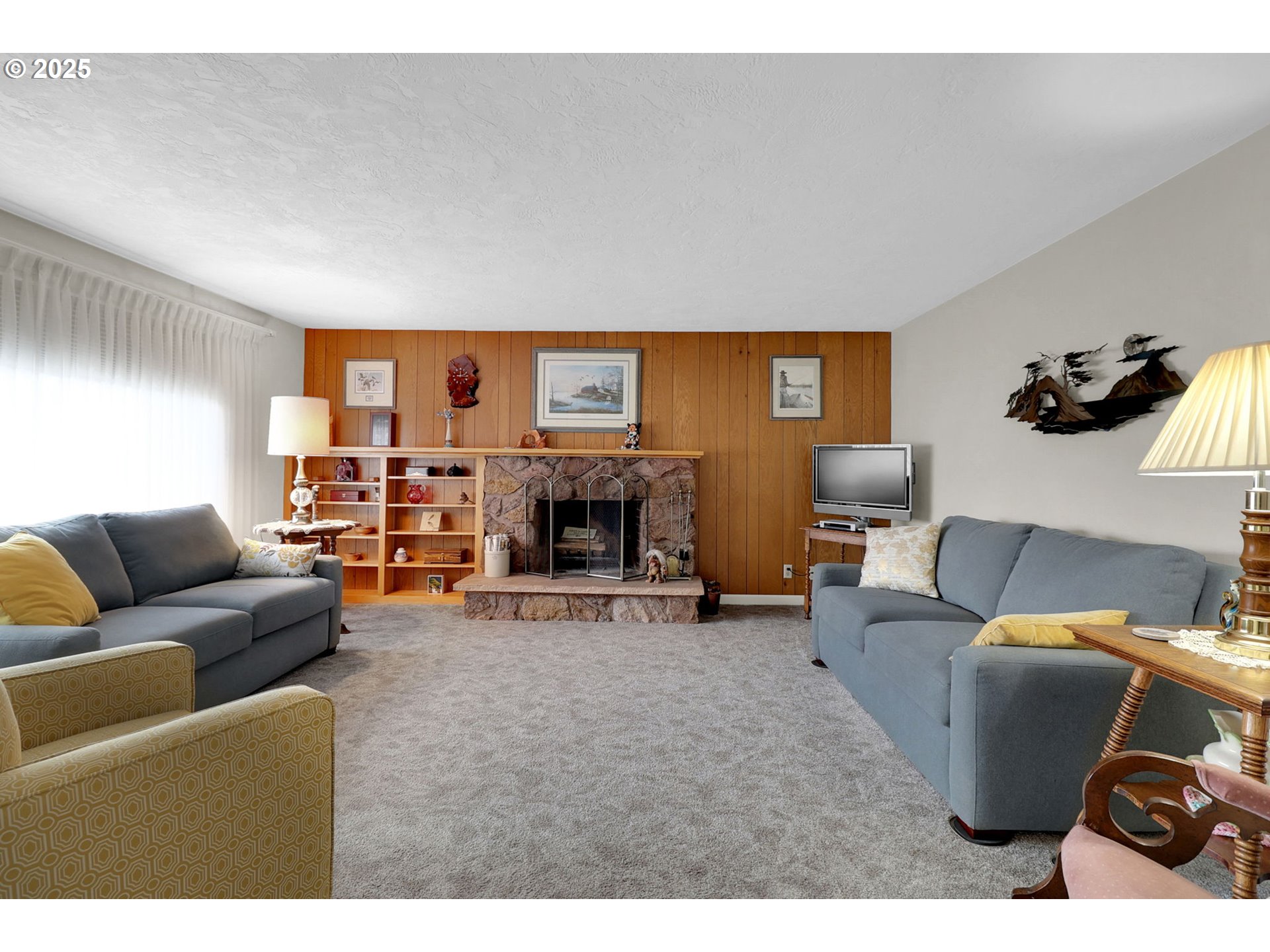 1448 Cheek Street Springfield, OR 97477 - Photo 6 of 28 a living room with furniture and a fireplace