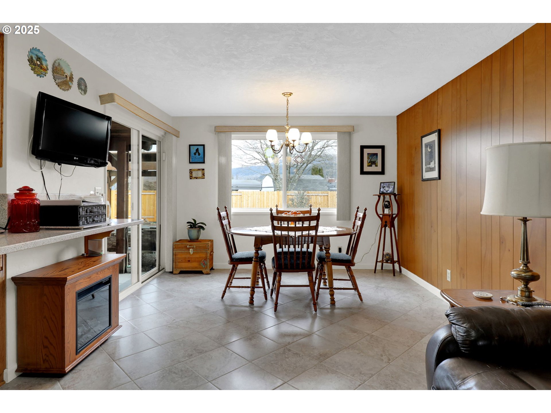 1448 Cheek Street Springfield, OR 97477 - Photo 9 of 28 a dining room with furniture and window