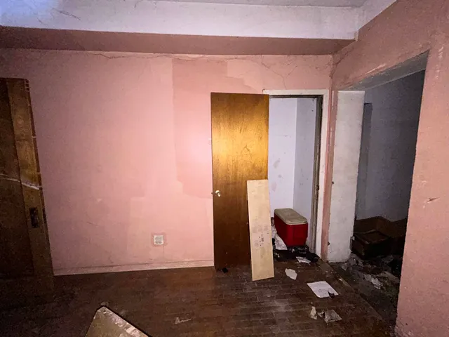 a workspace with furniture and window