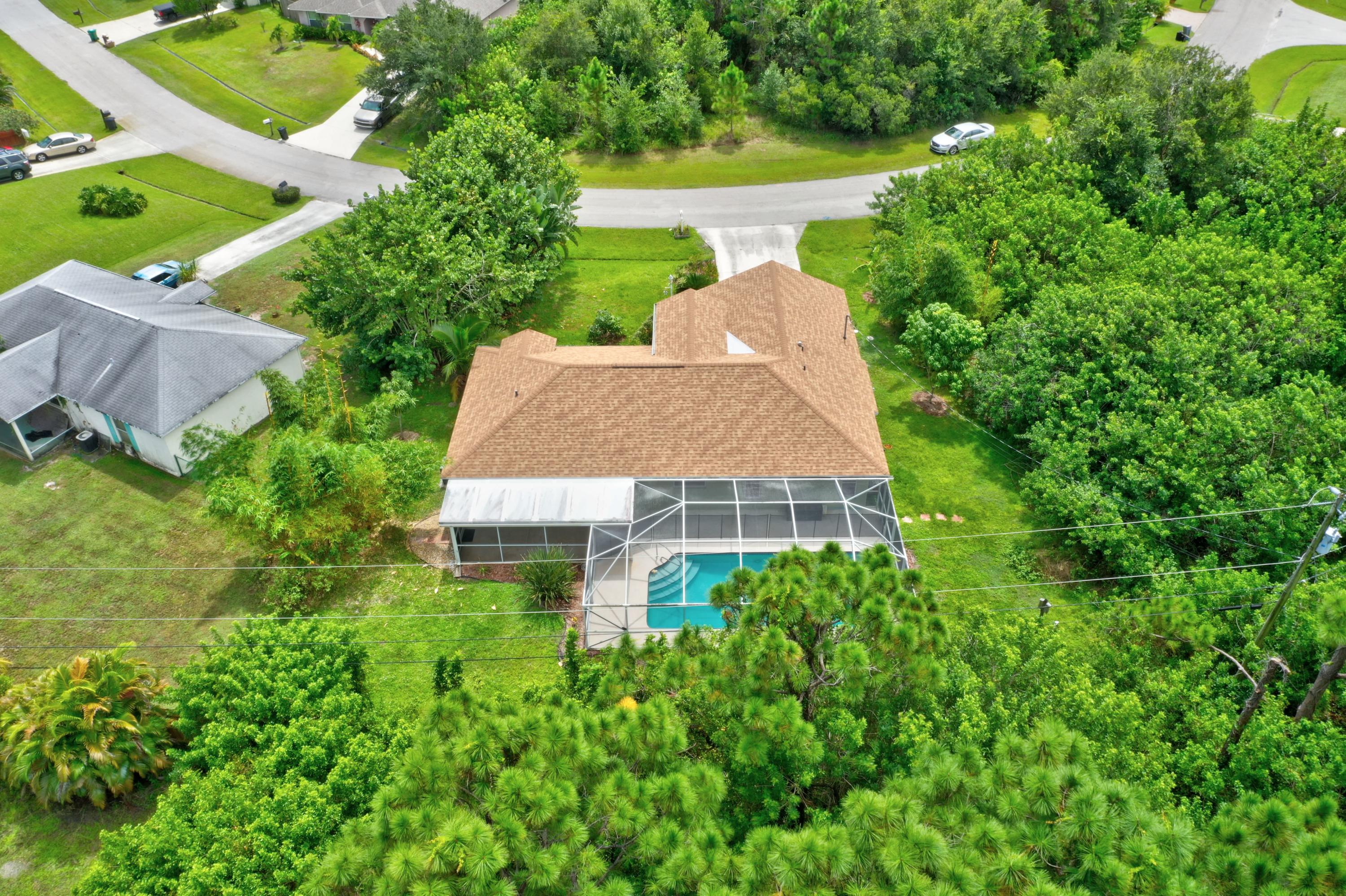 261 Southwest Glen Road Port St. Lucie, FL 34953 - Photo 2 of 43 DJI_0978_79_80_81_82