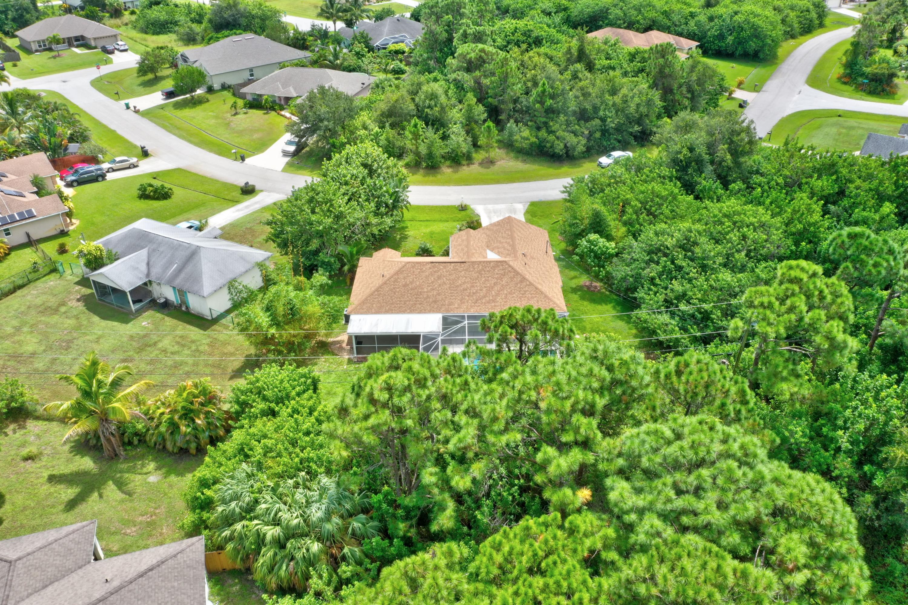 261 Southwest Glen Road Port St. Lucie, FL 34953 - Photo 3 of 43 DJI_0973_4_5_6_7