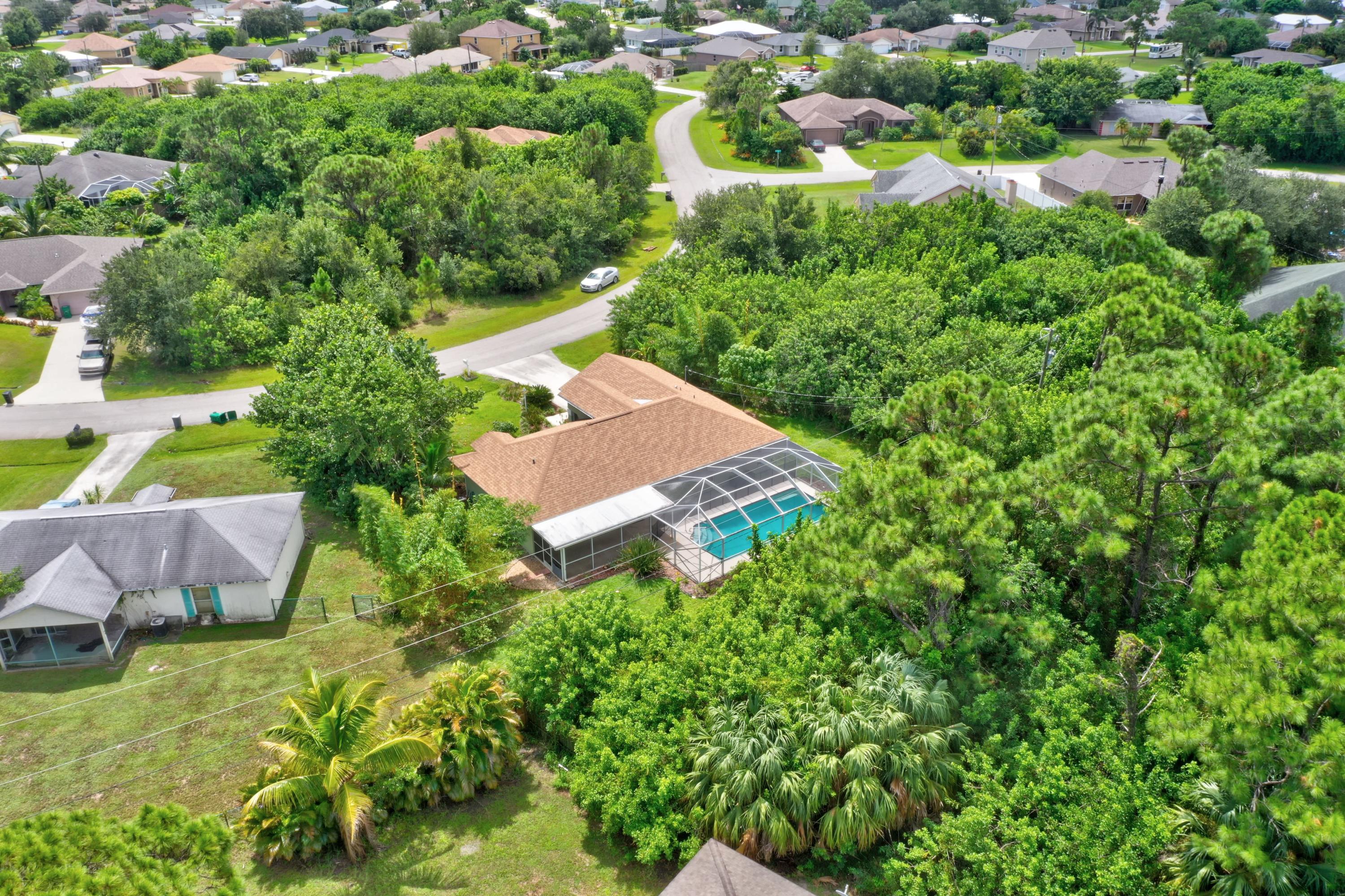 261 Southwest Glen Road Port St. Lucie, FL 34953 - Photo 5 of 43 DJI_0958_59_60_61_62