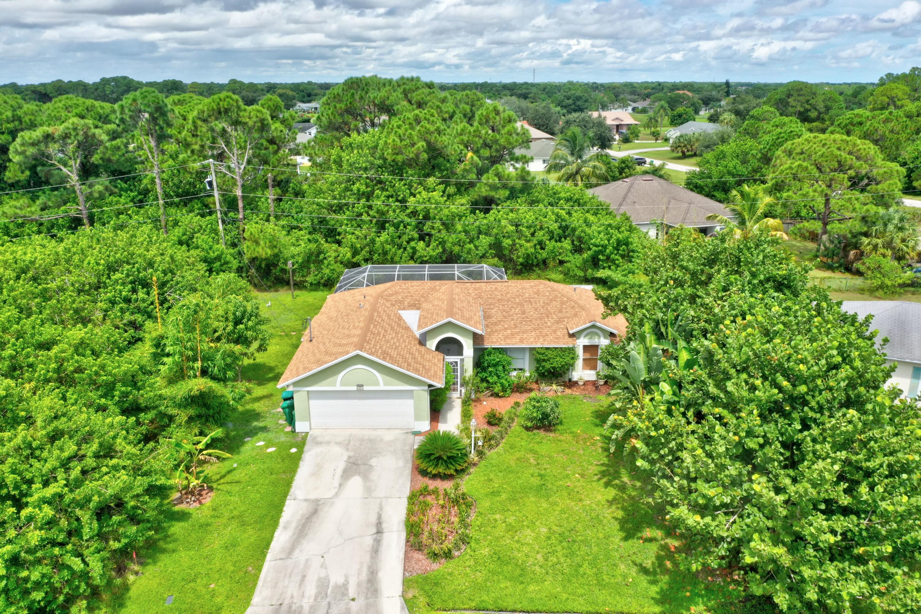 261 Southwest Glen Road Port St. Lucie, FL 34953 - Photo 9 of 43 DJI_0933_4_5_6_7