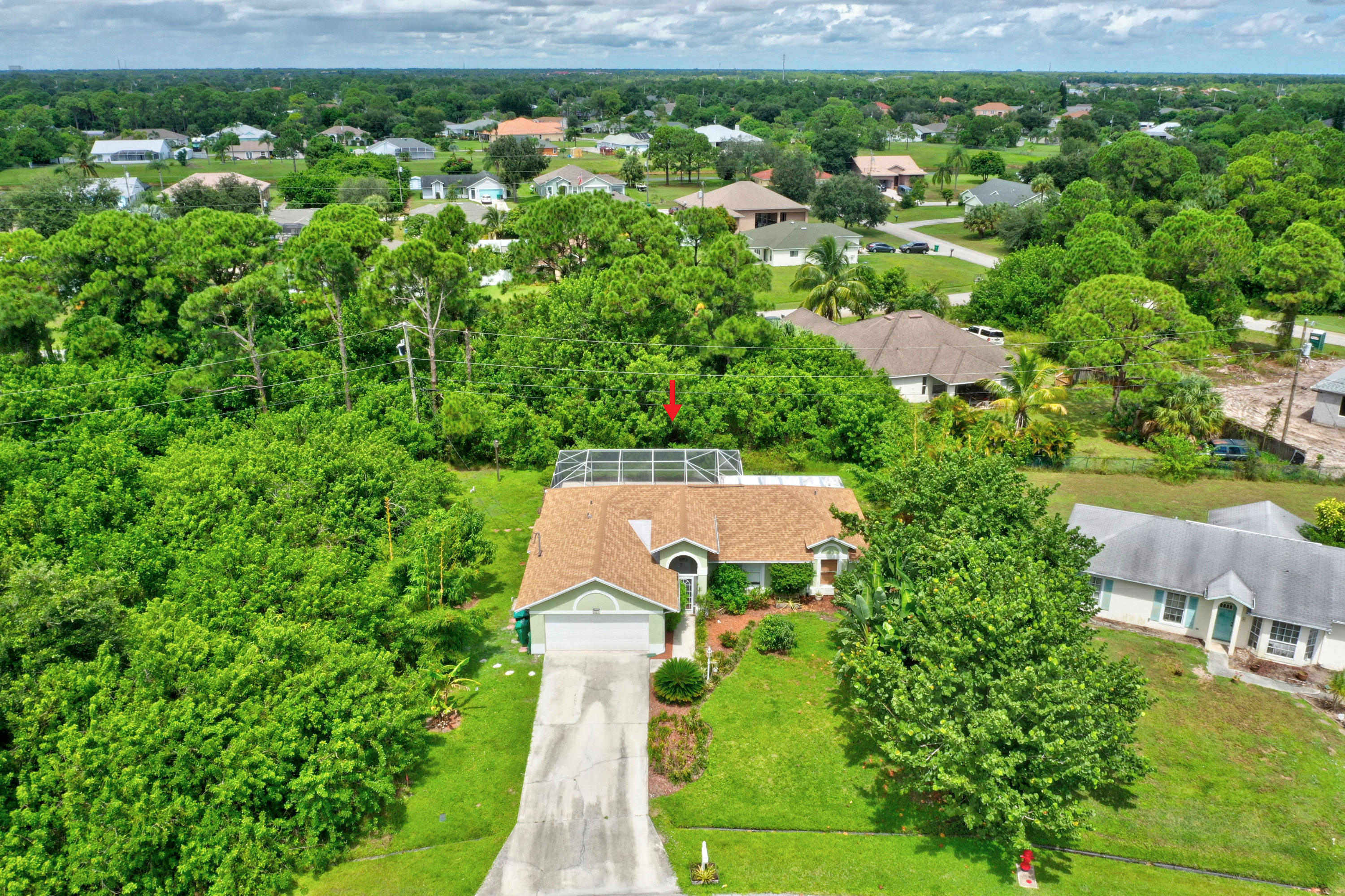 261 Southwest Glen Road Port St. Lucie, FL 34953 - Photo 10 of 43 DJI_0938_39_40_41_42
