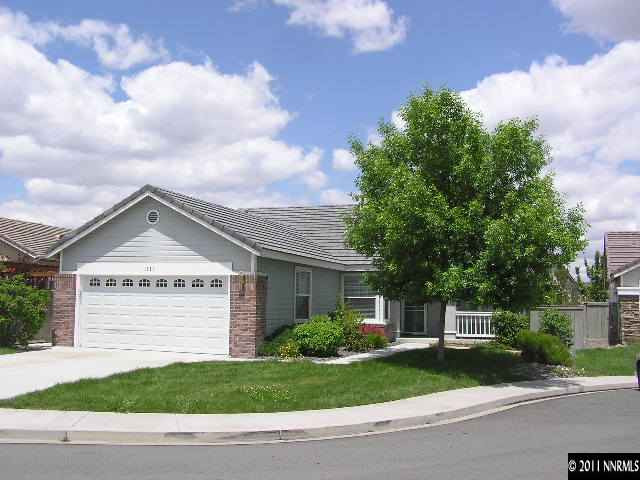1721 Northrup Court Reno, NV 89521 - Photo 1 of 1 a front view of a house with a yard and garage