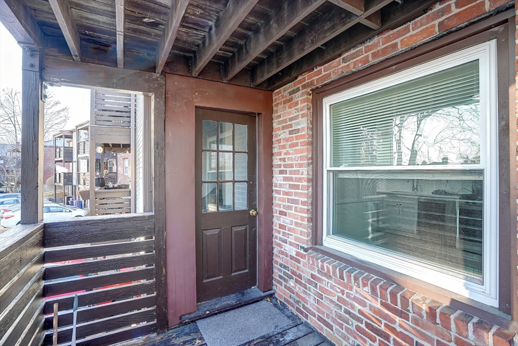 23 Langley Circle, Unit 1 Quincy, MA 02170 - Photo 23 of 27 a view of a door of the house
