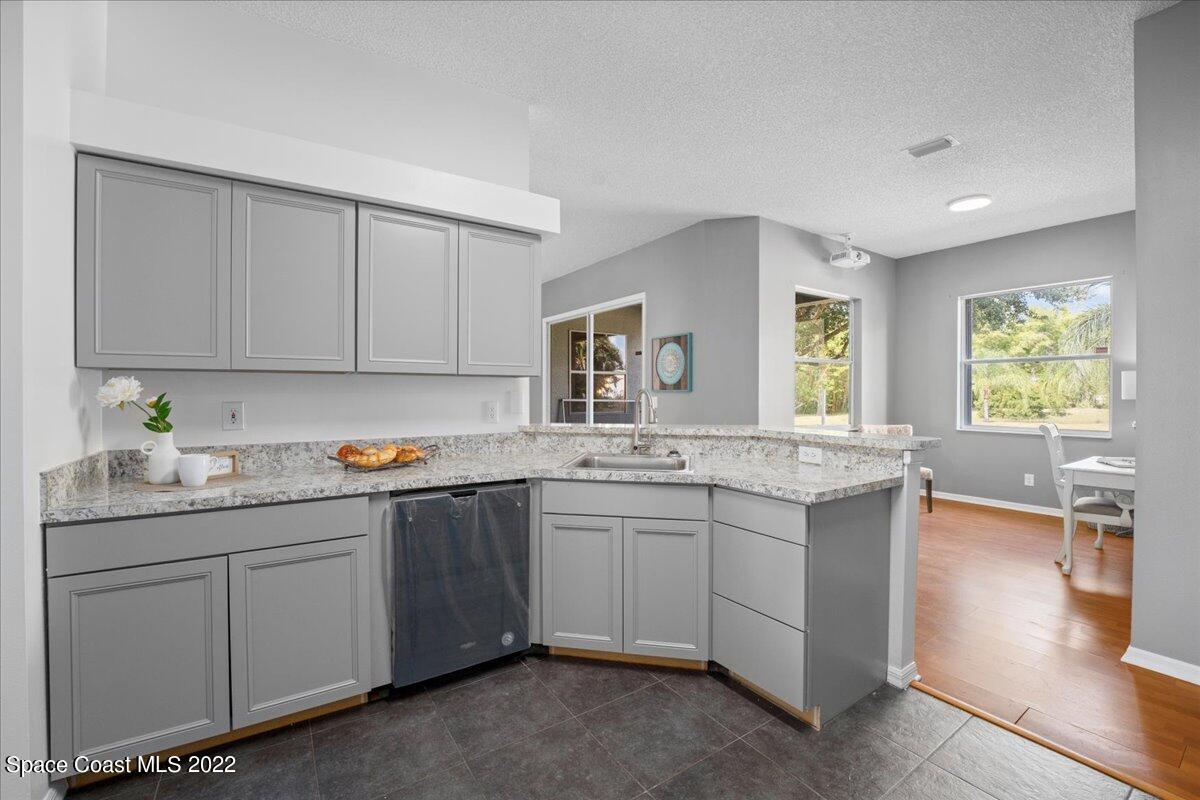 2030 Weber Road Malabar, FL 32950 - Photo 13 of 41 a kitchen with lots of counter top space