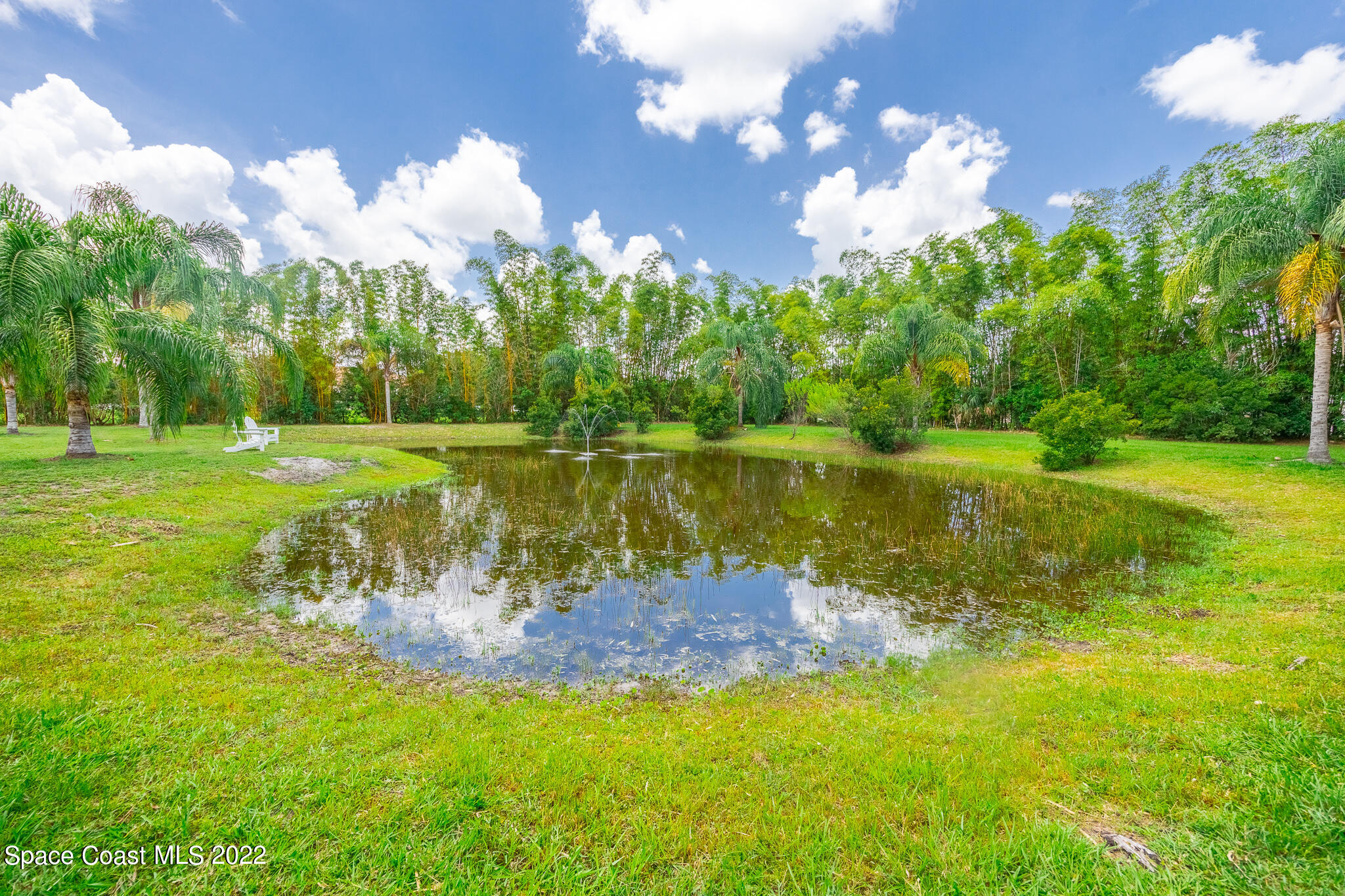 2030 Weber Road Malabar, FL 32950 - Photo 30 of 41 a view of a lake with a big yard