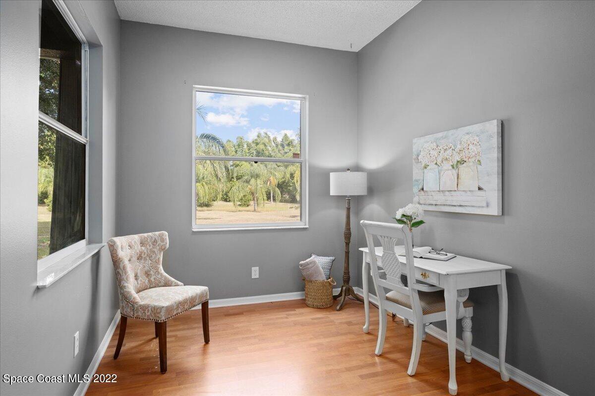 2030 Weber Road Malabar, FL 32950 - Photo 9 of 41 a workspace with furniture and a window