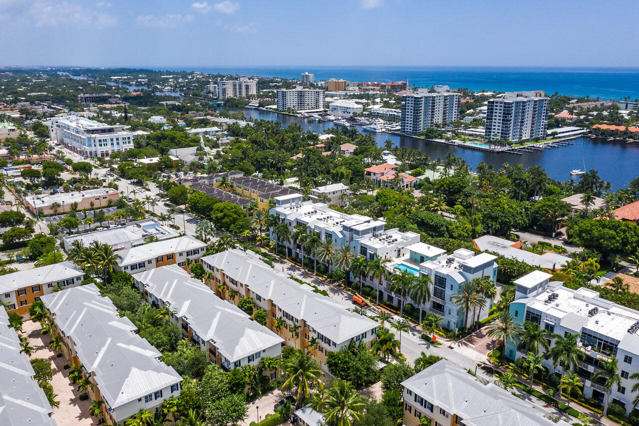 335 Southeast 6th Avenue, Unit 304 Delray Beach, FL 33483 - Photo 27 of 37 an aerial view of residential houses with city view