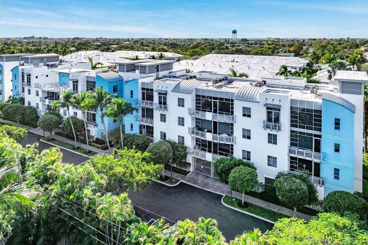 335 Southeast 6th Avenue, Unit 304 Delray Beach, FL 33483 - Photo 35 of 37 a view of a city with tall buildings