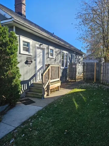 a house view with a garden space
