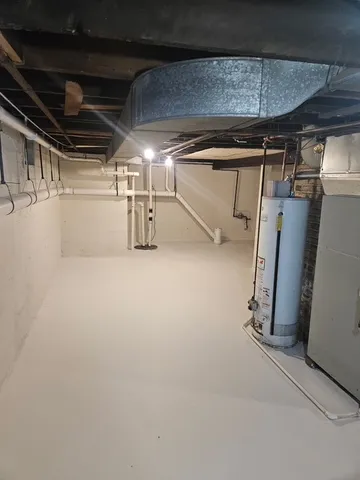 a view of a garage with wooden walls