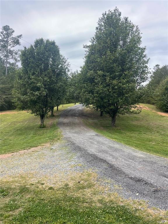 126 Findley Road Rydal, GA 30171 - Photo 2 of 4 a view of outdoor space with deck and yard