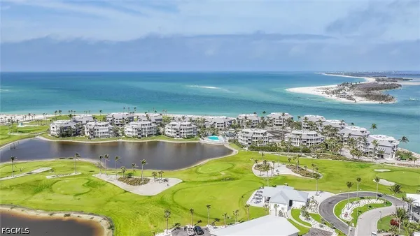 an aerial view of a house with a garden and plants