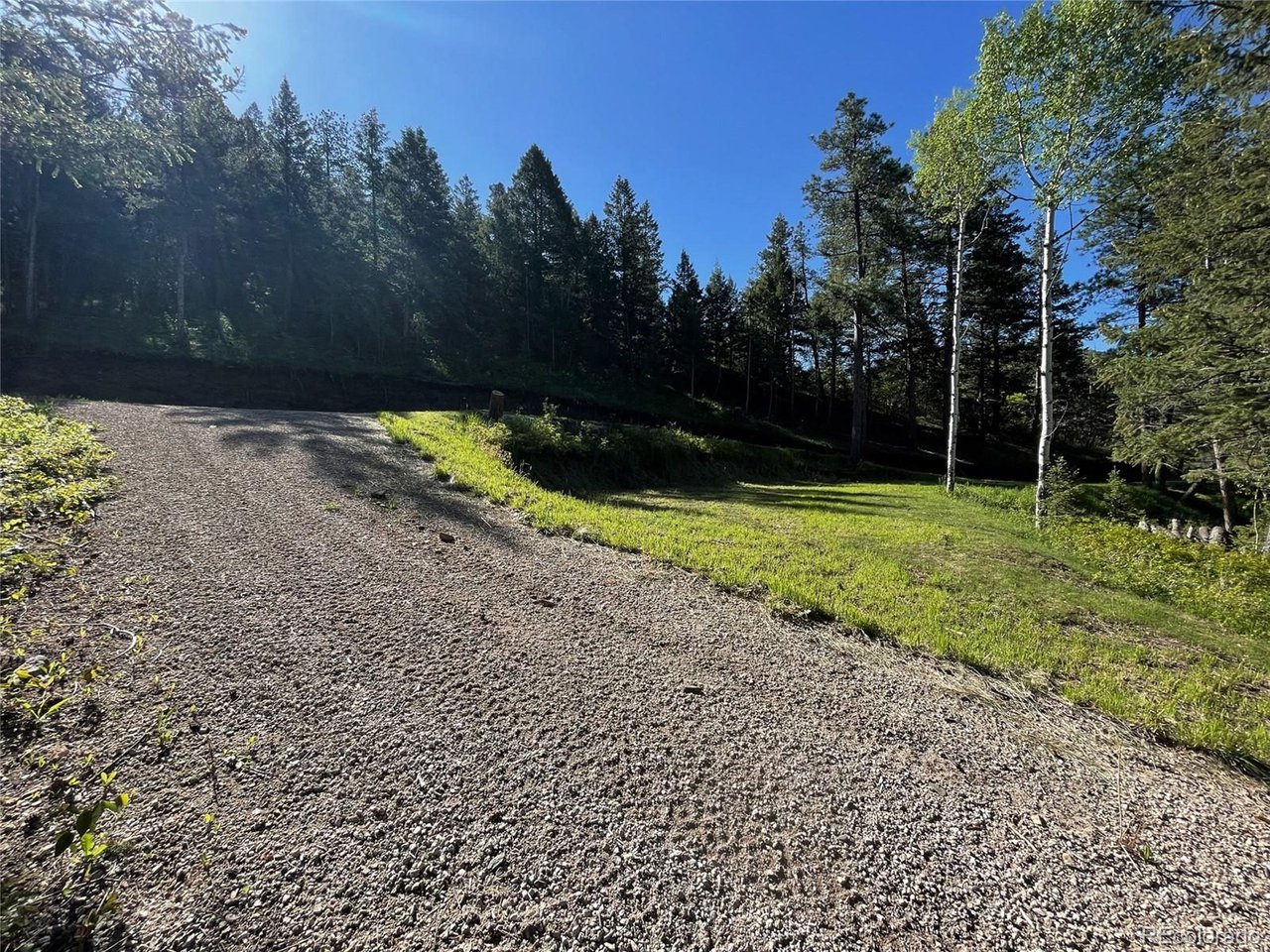 2 South Maxwell Hill Road Littleton, CO 80127 - Photo 23 of 29 a view of a backyard