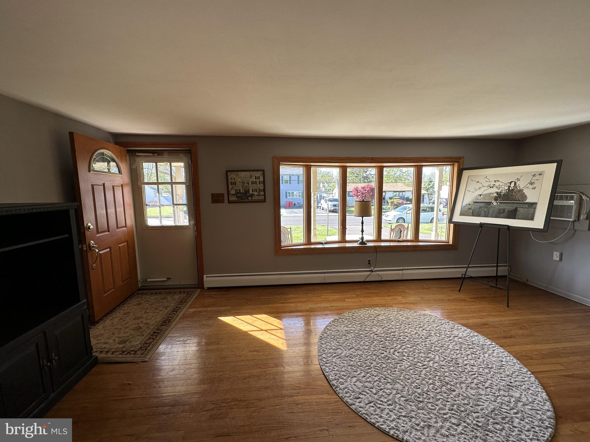 833 Roger Road Warminster, PA 18974 - Photo 5 of 36 Front door with bow window in living room