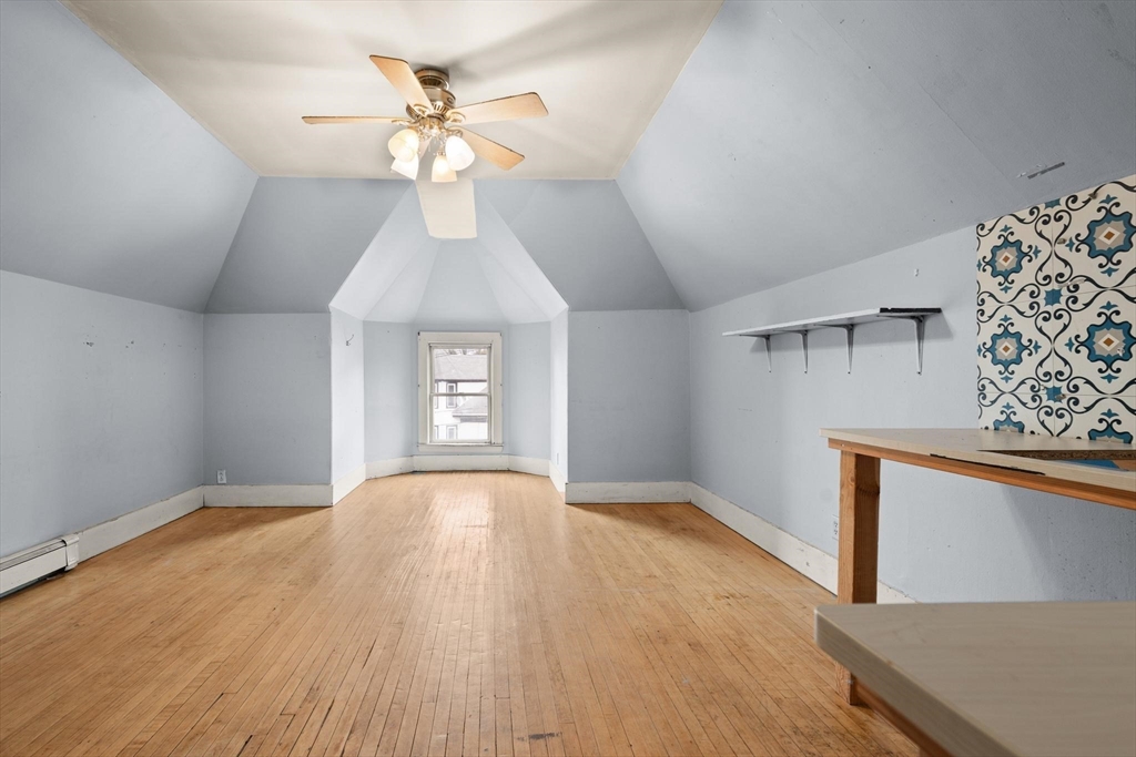 68 Murdock Street Boston, MA 02135 - Photo 26 of 35 wooden floor in an empty room with a window
