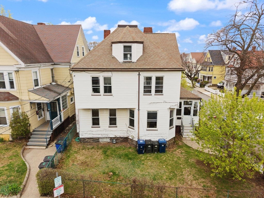 68 Murdock Street Boston, MA 02135 - Photo 3 of 35 front view of a house with a yard