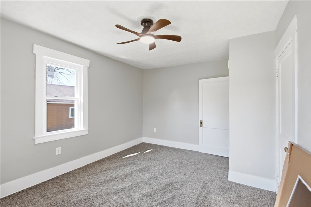 1925 Sunset Avenue Springfield, OH 45505 - Photo 28 of 45 This cozy bedroom offers comfort and a tranquil atmosphere with soft carpet and a bright window.
