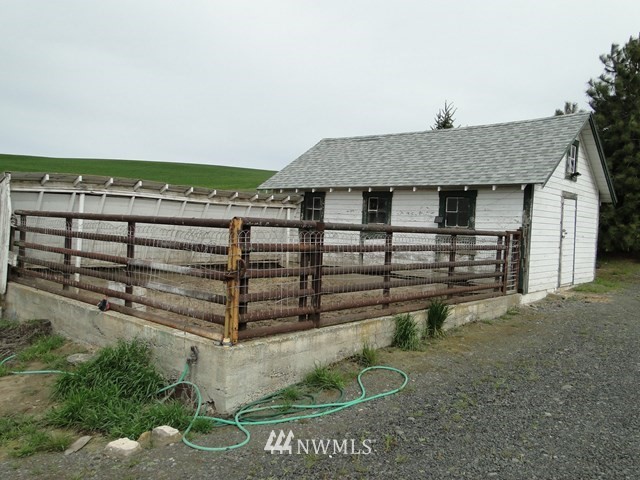 3890 Upton Road Prescott, WA 99348 - Photo 29 of 31 a view of a house with a yard