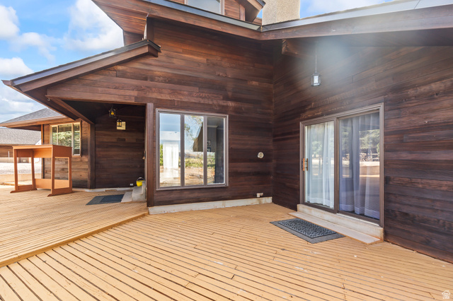 460 Omni Point Road Central Valley, UT 84754 - Photo 71 of 101 Expansive outdoor deck featuring wood-finish flooring and direct access to the interior via sliding glass doors