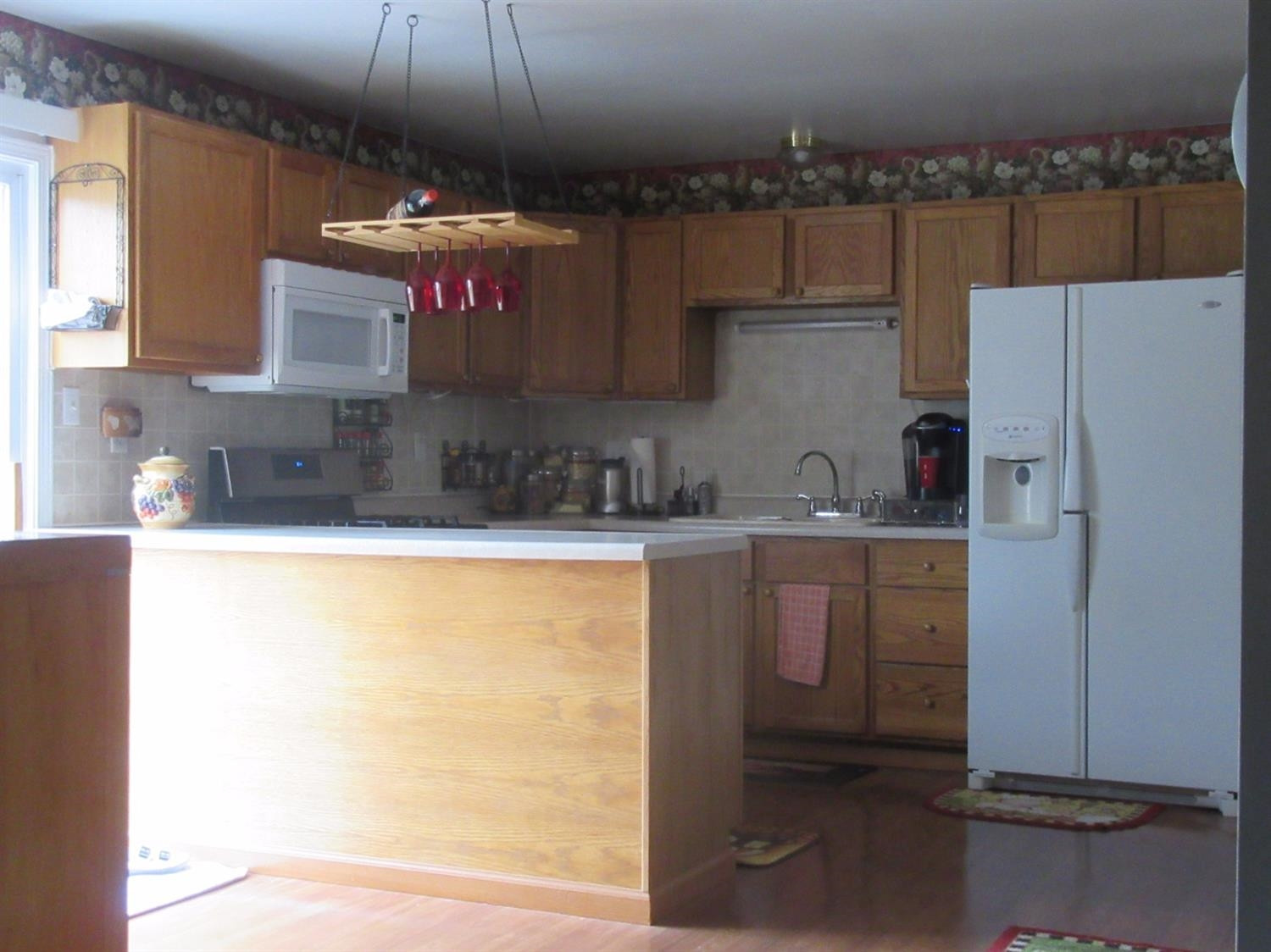 755-1 Governor Road Valparaiso, IN 46385 - Photo 6 of 10 a kitchen with a refrigerator and a sink