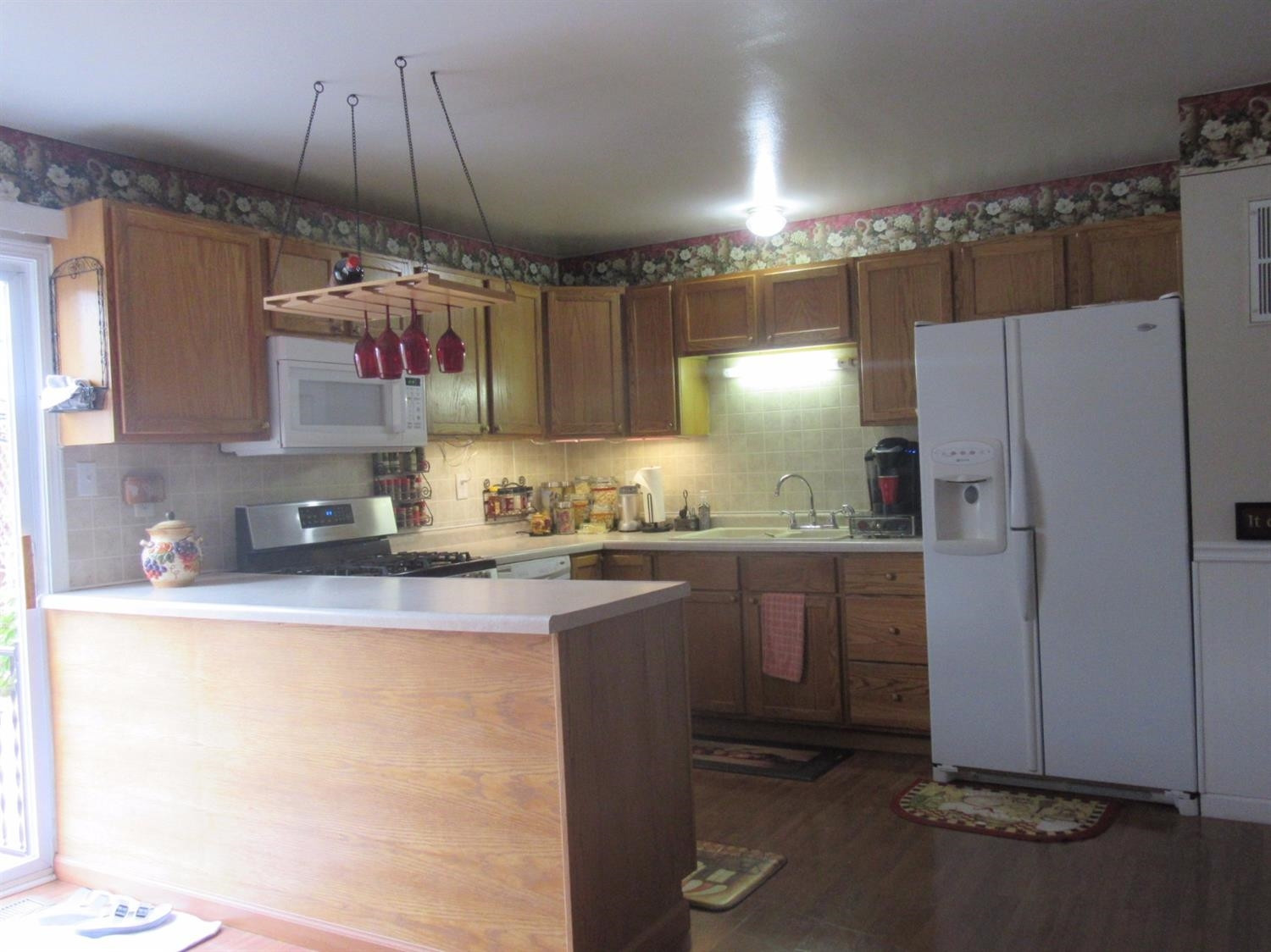 755-1 Governor Road Valparaiso, IN 46385 - Photo 7 of 10 a kitchen with refrigerator and cabinets